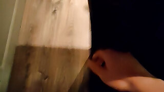 Diminutive Sausage Comes on Bar Chair in Condom